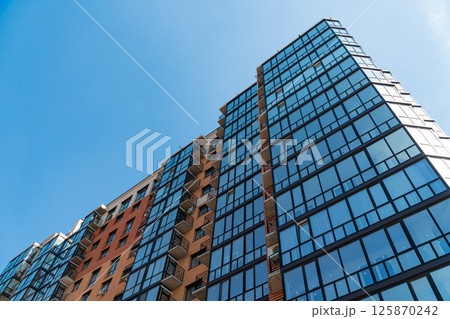 Apartment residential house. Modern apartment buildings on a sunny day with a blue sky 125870242