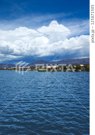 Totora boat on the Titicaca lake near Puno, Peru 125871505