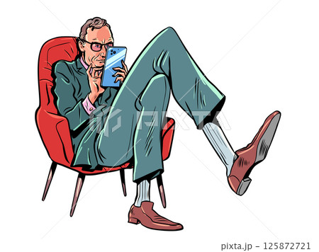 Serious businessman spends time on the phone. Chatting on social networks and following the news. Man in a suit with a phone. Serious businessman spends time on the phone. Chatting on social networks and following the news. Man in a suit with a phone. 125872721