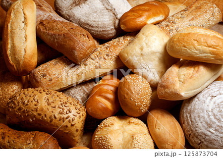 Fresh fragrant bread on the table Fresh fragrant bread on the table 125873704