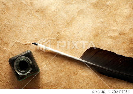 Quill pen and ink well 125873720