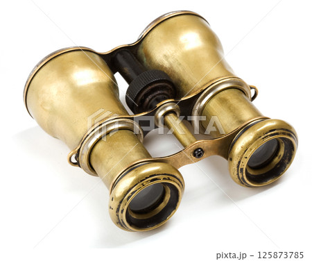 Vintage binoculars on white 125873785