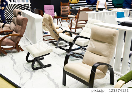 Armchairs in furniture shop 125874121