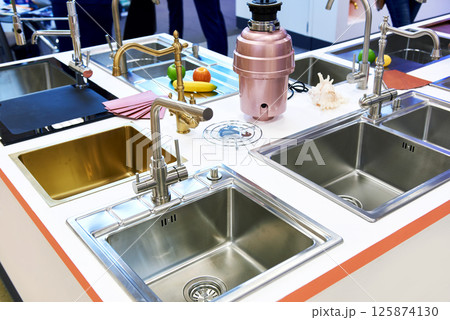 Exhibition of kitchen sinks in store 125874130