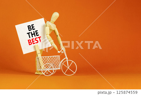 Motivational be the best symbol. Concept words Be the best on beautiful white card. Beautiful orange background. Businessman model. Business motivational be the best concept. Copy space. 125874559