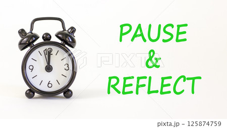 Pause and reflect symbol. Concept words Pause and reflect on beautiful white paper. Alarm clock. Beautiful white paper background. Business motivational lifestyle pause and reflect concept. Copy space Pause and reflect symbol. Concept words Pause and reflect on beautiful white paper. Alarm clock. Beautiful white paper background. Business motivational lifestyle pause and reflect concept. Copy space 125874759
