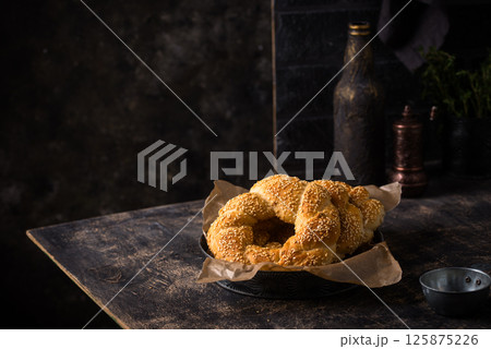 Traditional Turkish bagel simit with sesame Traditional Turkish bagel simit with sesame 125875226