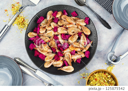 Prawns shrimps roasted with dragon fruit. 125875542