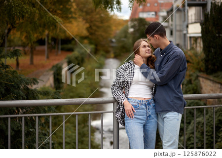 Young Cute Female Hugs Boyfriend. In Autumn Outdoor. Lovers Walking in Park. Attractive Funny Couple. Lovestory in Forest. Man and Woman. Cute Lovers in the Park. Family Concept. Happy Couple. Young Cute Female Hugs Boyfriend. In Autumn Outdoor. Lovers Walking in Park. Attractive Funny Couple. Lovestory in Forest. Man and Woman. Cute Lovers in the Park. Family Concept. Happy Couple. 125876022