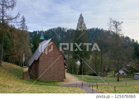 Scenic Countryside Landscape with a Small Brick Chapel and Traditional Houses in a Green Valley of the Black Forest, Germany Scenic Countryside Landscape with a Small Brick Chapel and Traditional Houses in a Green Valley of the Black Forest, Germany 125876068