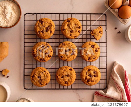 Chocolate chip cookies cooling on a tray Chocolate chip cookies cooling on a tray 125879697