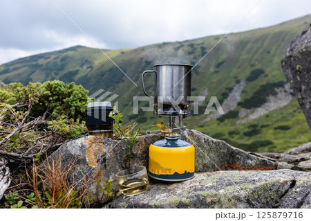 Mountain Tea Brewing Moment. 125879716