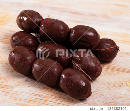 Blood sausages on wooden table Blood sausages on wooden table 125882505