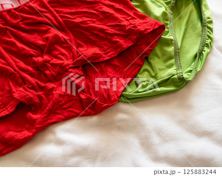 Colorful underwear display cozy bedroom fashion indoor close-up style inspiration 125883244