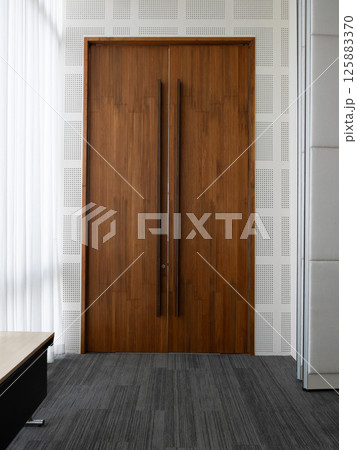 Elegant wooden door design for modern minimalist office interior architecture Elegant wooden door design for modern minimalist office interior architecture 125883370
