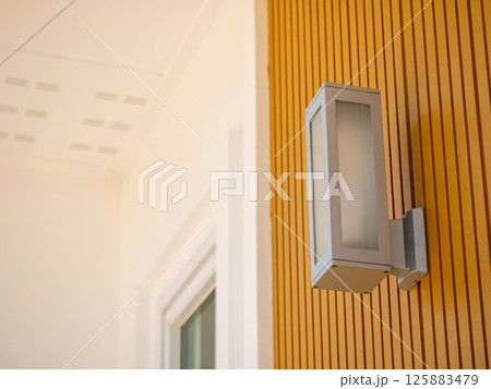 Close-up view of modern exterior lighting architectural detail in minimalist design 125883479