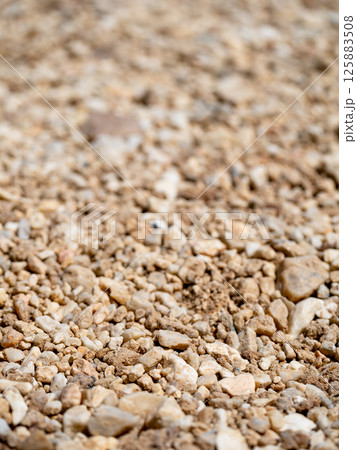 Exploring gravel texture outdoor setting macro natural environment close-up view material study Exploring gravel texture outdoor setting macro natural environment close-up view material study 125883508