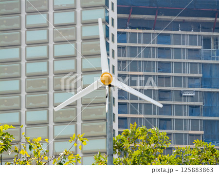 Urban landscapes and wind turbines building a sustainable future with renewable energy Urban landscapes and wind turbines building a sustainable future with renewable energy 125883863