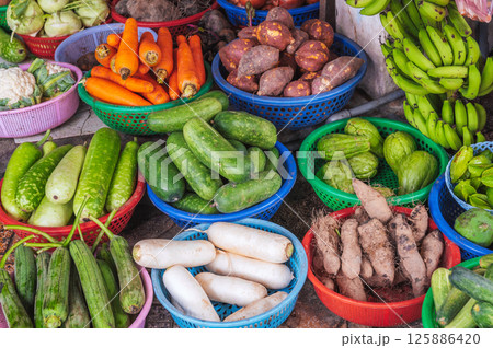 assortment of fresh vegetables at the street market in Vietnam in Asia 125886420