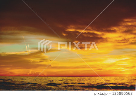 Seascape in the evening. Dramatic sunset over the sea. Nature landscape 125890568