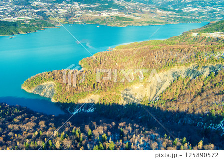 Mountain lake in autumn Aerial view. Serre-Poncon mountain lake in winter in Hautes Alpes, France 125890572