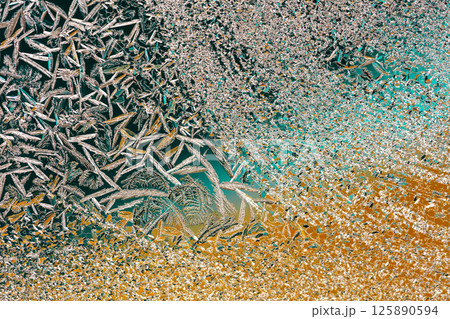 Ice texture on the window. Gradient color. Abstract background Ice texture on the window. Gradient color. Abstract background 125890594