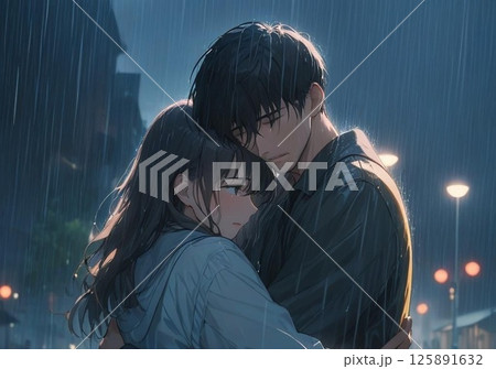 夜の雨の中切なそうに抱き合う男女 125891632