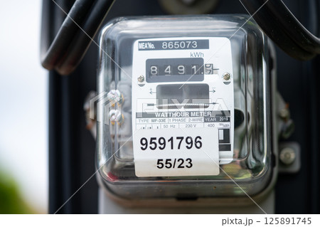 Electric measuring power meter for energy cost at home and office. 125891745