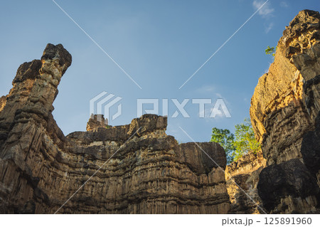 travel and people activity concept with mountain and rock in tropical forest travel and people activity concept with mountain and rock in tropical forest 125891960
