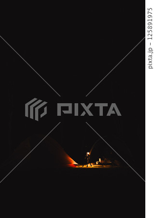 travel and people activity concept with night camping with lighting and camping tent travel and people activity concept with night camping with lighting and camping tent 125891975
