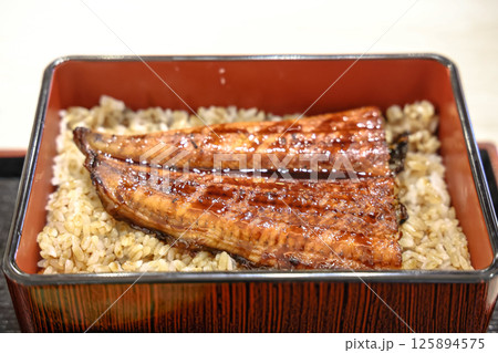 Japanese Grilled Eel with Rice in Traditional Bento Box 125894575