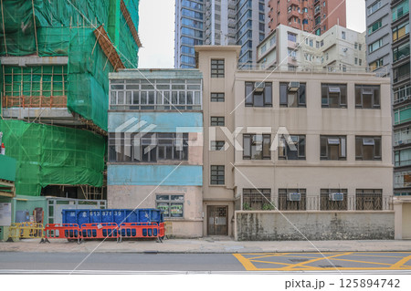 May 5 2025 Residential Building with Rustic Appearance and Large Windows May 5 2025 Residential Building with Rustic Appearance and Large Windows 125894742