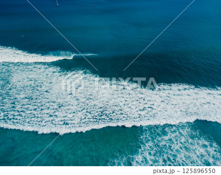 Aerial view with surfing on perfect wave. Surf waves in ocean 125896550