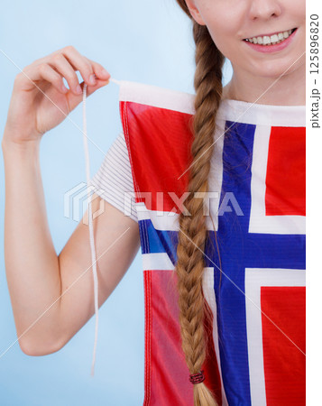 Girl with norwegian flag 125896820