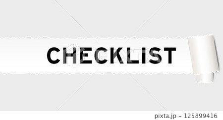 Ripped gray paper background that have word checklist under torn part Ripped gray paper background that have word checklist under torn part 125899416