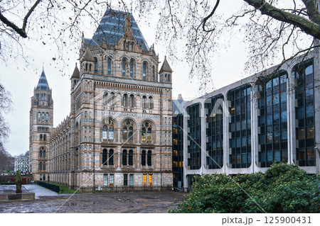 Natural History Museum in London (established 1881) as seen from side, on cold overcast day 125900431