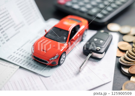 Finance bank tax expense accounting budget money businessman hand for Business expense analysis saving use car Financial calculate accountant close up calculator with graph chart write office desk 125900509