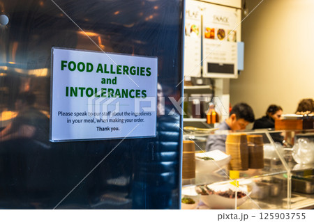 Food Allergy and Intolerance Warning Sign on Restaurant Kitchen Window for Customer Safety 125903755