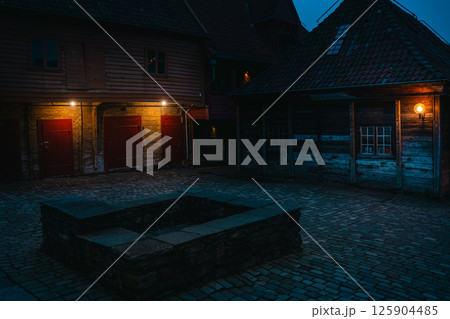 Evening streets and alleys of Bryggen Wharf in Bergen Norway Evening streets and alleys of Bryggen Wharf in Bergen Norway 125904485