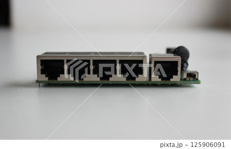 Ethernet ports for connecting network cables on the opened network switch panel Ethernet ports for connecting network cables on the opened network switch panel 125906091