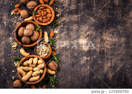 Assortment of different nuts and seeds 125908760