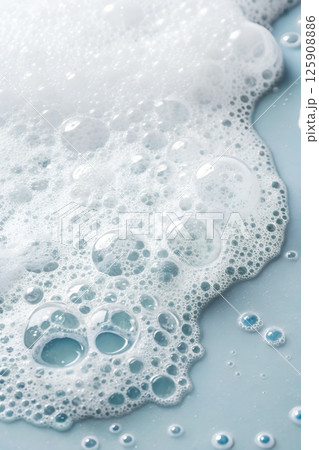 Macro shot of light foam bubbles forming intricate patterns 125908886