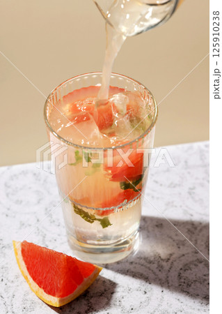 glass of grapefruit mocktail glass of grapefruit mocktail 125910238
