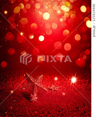キラキラした抽象的な赤い光とキラキラの背景 キラキラした抽象的な赤い光とキラキラの背景 125914498