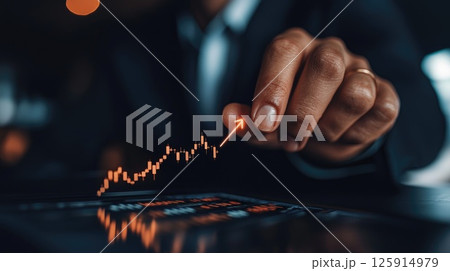 Businessperson Analyzing Data in a Futuristic Setting 125914979