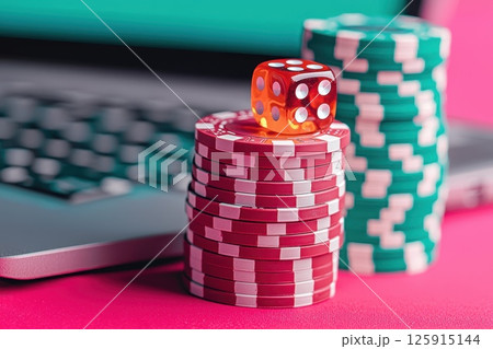 A stack of poker chips with a red die on top A stack of poker chips with a red die on top 125915144