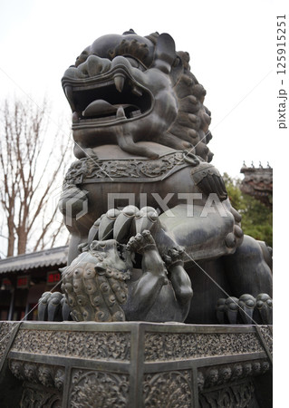 Guardian Lion Statue in Front of an Ancient Building at the Summer Palace, Beijing, China 125915251