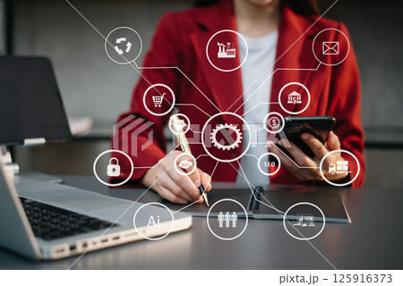 Businesswoman using smartphone and laptop and tablet computer with Digital marketing media in virtual icons 125916373