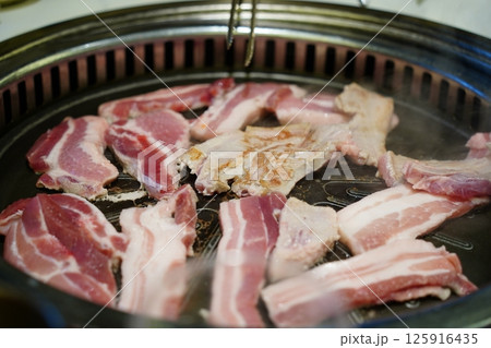 Close-Up of Delicious Korean Barbecue with Samgyeopsal (Pork Belly) 125916435