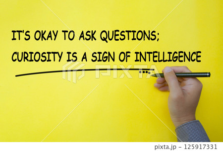 It is okay to ask questions, curiosity is a sign of intelligence text written on yellow cover background. Inspirational and motivational concept. It is okay to ask questions, curiosity is a sign of intelligence text written on yellow cover background. Inspirational and motivational concept. 125917331